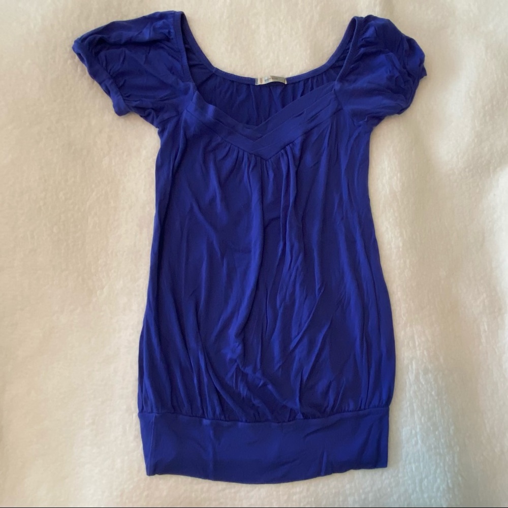 Blue short sleeved top.